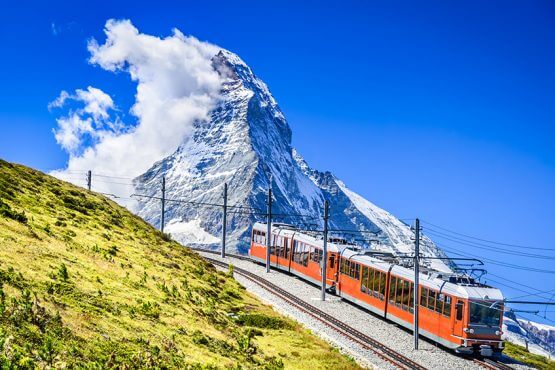 Gornergrat train through Matterhorn mountains in Switzerland