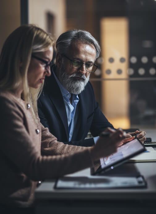 Company director reviewing paperwork