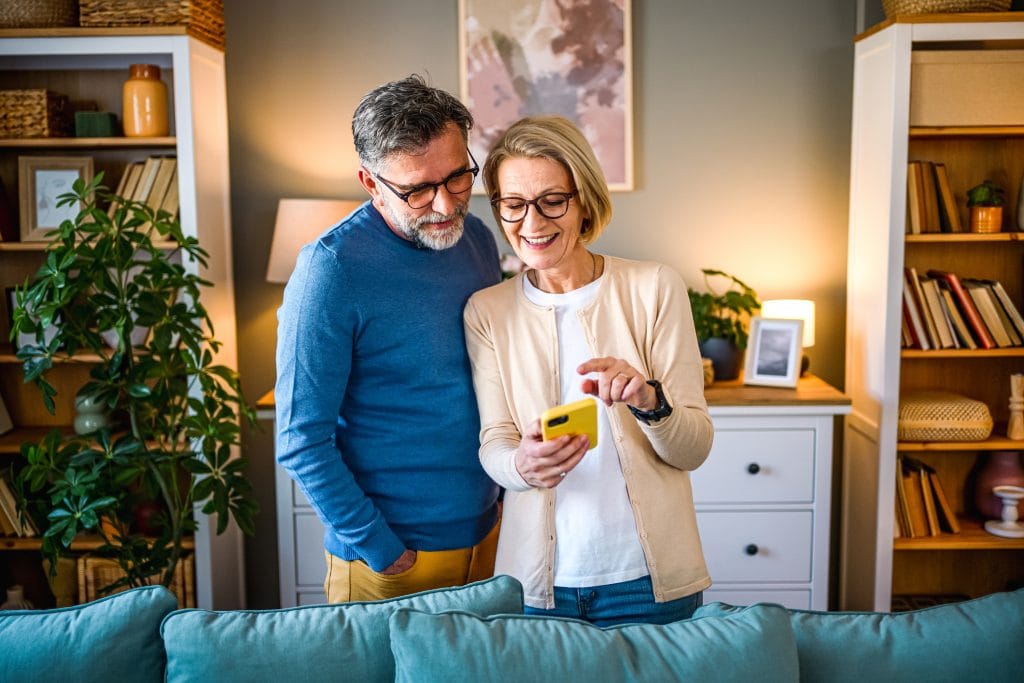 Couple using online equity release calculator