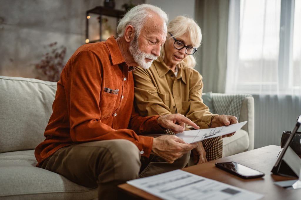 Senior couple reviewing equity release options